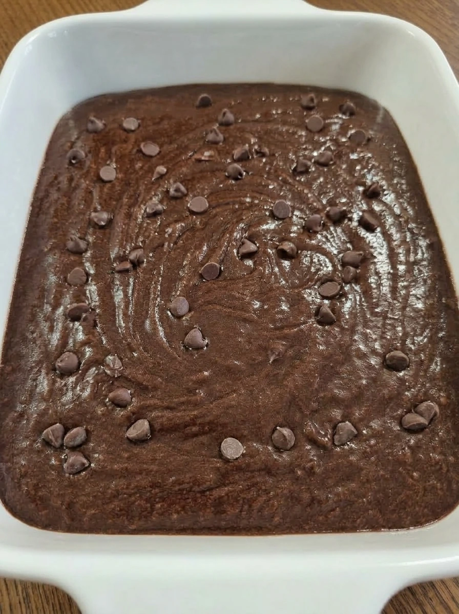 Brownie batter with chocolate chips folded in