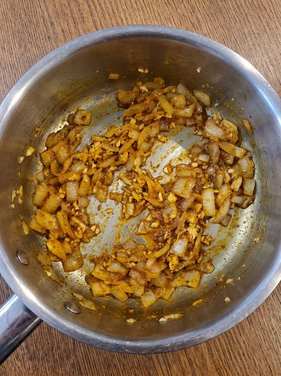 Softened onions garlic ginger and spices cooking for Chicken Tikka Masala sauce.