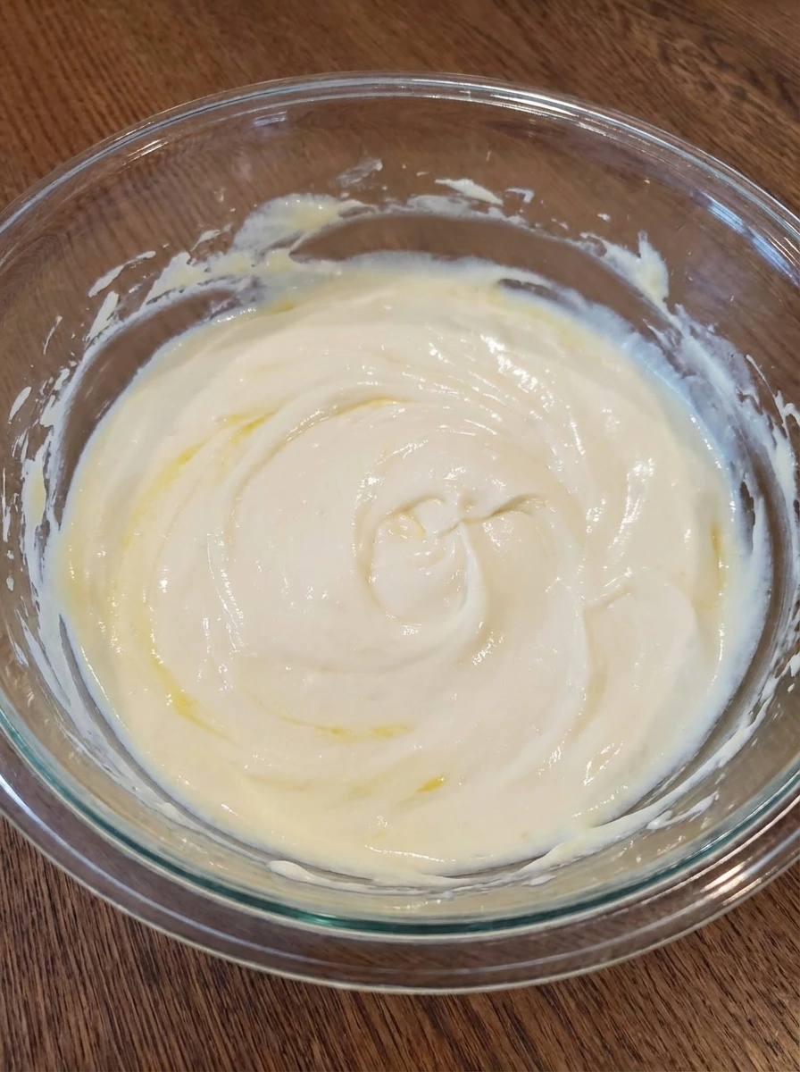 Cream cheese mixture becoming smooth for no bake cheesecake filling.
