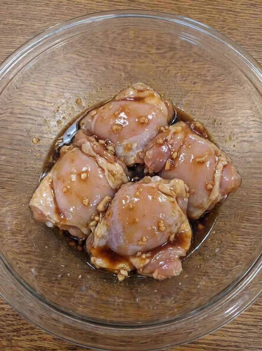 Chicken thighs coated in honey garlic sauce
