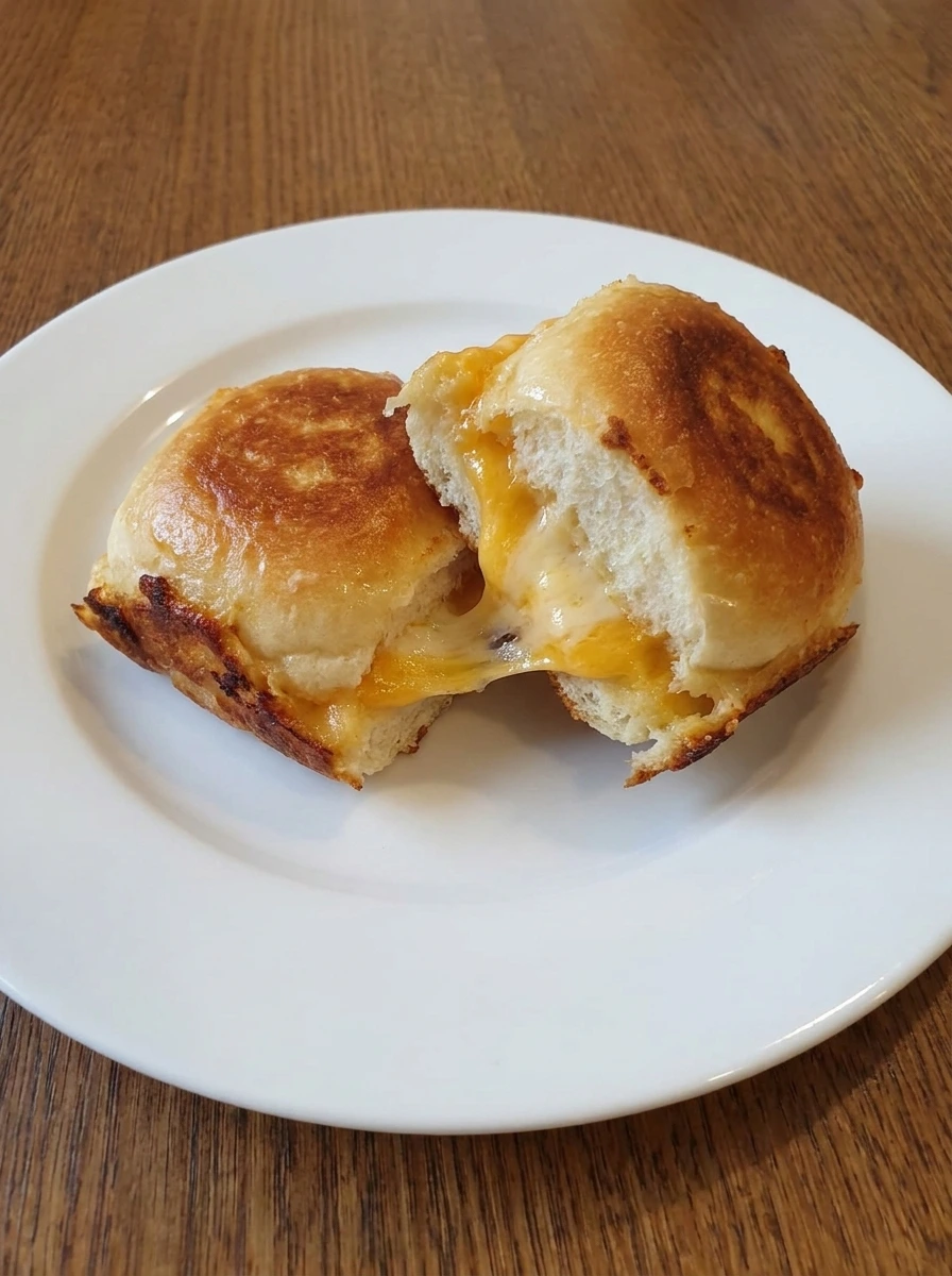 Served Mini Grilled Cheese Sliders with melted cheese visible inside.