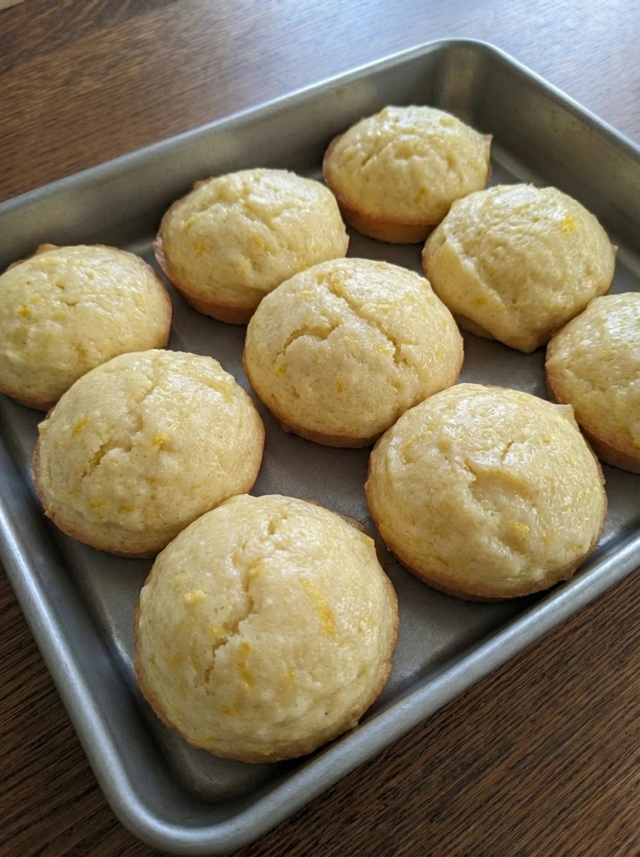 Baked mini lemon cakes with lightly golden tops