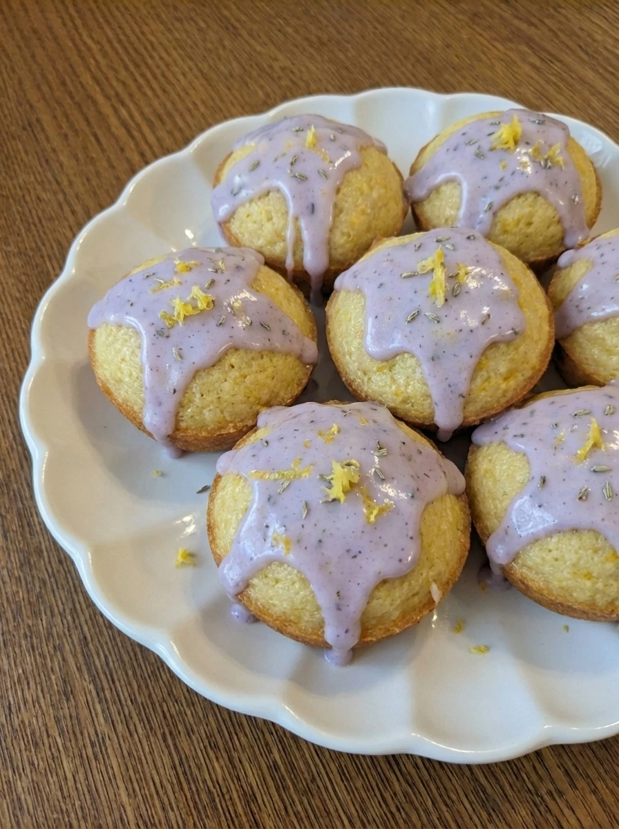 Plated Mini Lemon Cakes with Lavender Glaze ready to serve