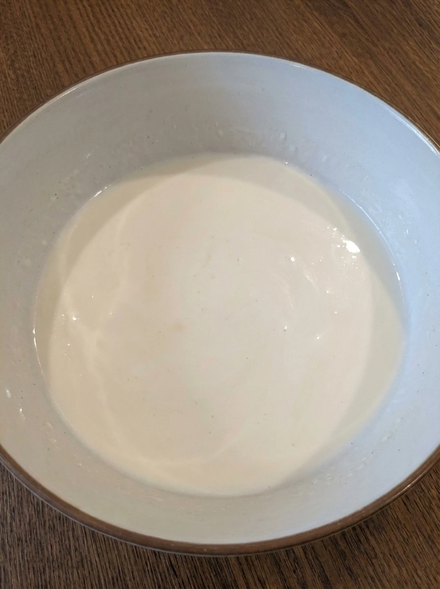 Buttermilk and vanilla mixed for Peach Butter Swim Biscuits