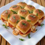 Pizza Sliders with browned rolls and melted mozzarella and pepperoni