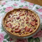 Strawberry Rhubarb Custard Pie baked until golden with creamy fruit filling.