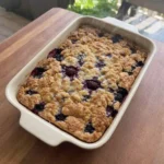 Easy Blackberry Cobbler with golden topping and blackberry filling