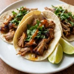 Crockpot Carnitas with tender shredded pork and crispy golden edges Recipe focus: crockpot carnitas recipes.