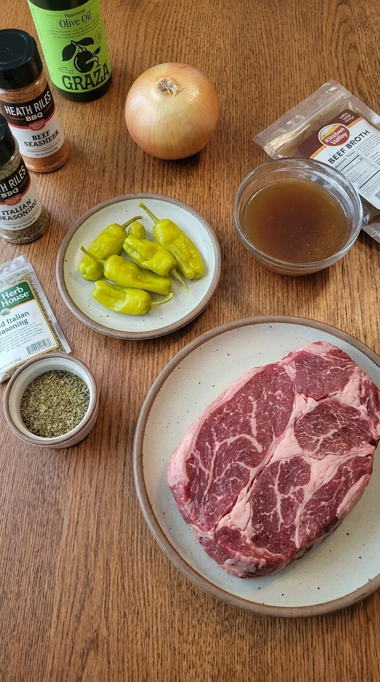 Crockpot Italian Beef Sandwiches ingredients with chuck roast pepperoncini and seasonings Recipe focus: beef crockpot meals.