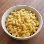 Crockpot Mac and Cheese Velveeta creamy elbow macaroni with melted cheese sauce Recipe focus: crockpot mac and cheese recipe velveeta.