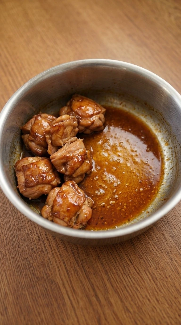 Crockpot Teriyaki Chicken glaze thickening into a glossy sauce Recipe focus: crockpot teriyaki chicken easy.