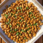 Roasted Pumpkin Seeds with Parmesan Cheese with golden shells, Parmesan flecks and parsley
