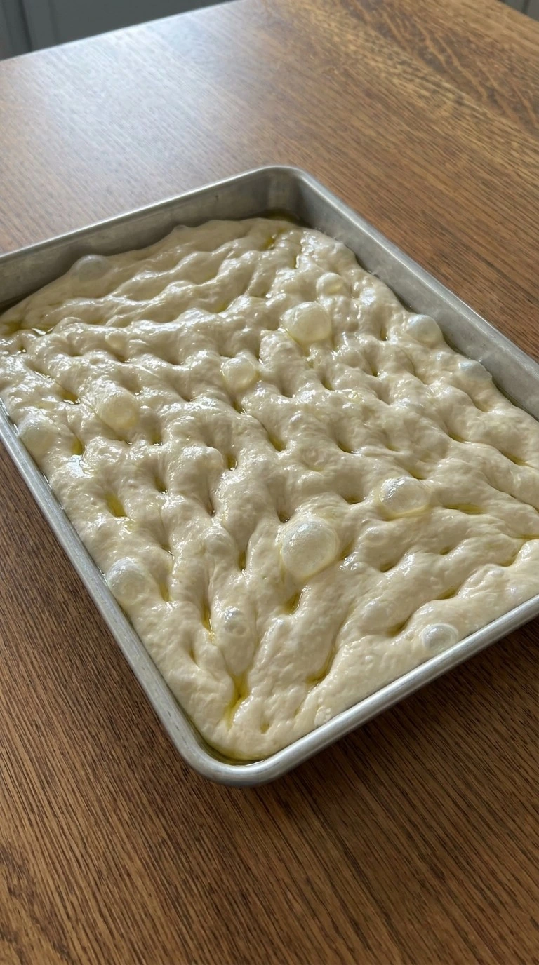 Thanksgiving Stuffing Focaccia Food Network shaped dough with dimples before baking