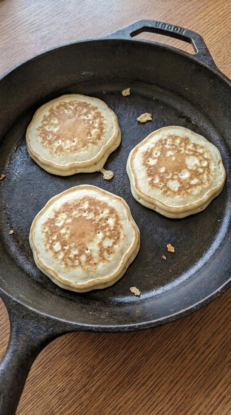 Golden flipped pancakes for Fluffy Buttermilk Pancakes from Scratch Recipe focus: easy pancake recipe.