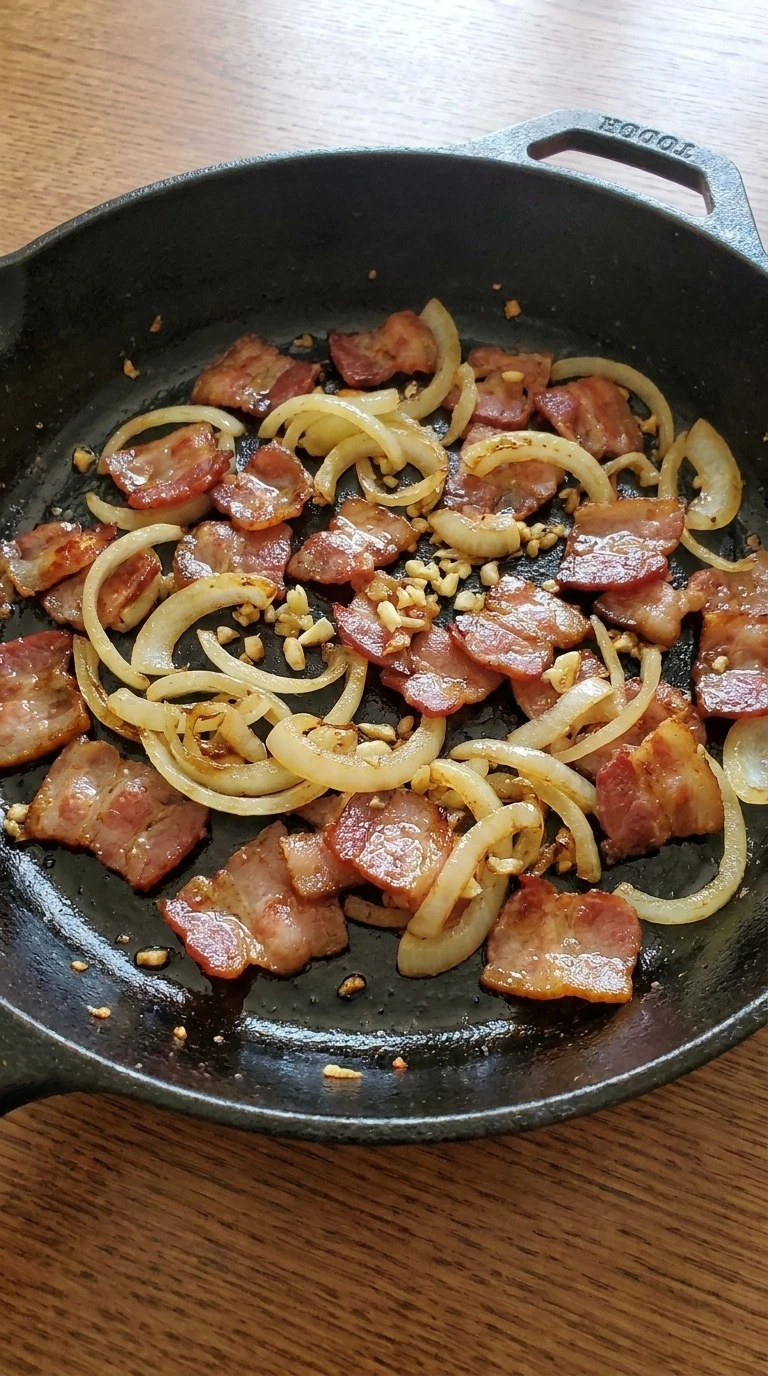 Loaded Baked Potato Soup bacon onion mixture turning golden in pan Recipe focus: potato soup recipe.