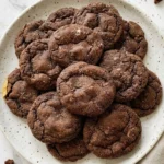 Chewy Chocolate Gingerbread Cookies with soft cracked tops on a plate Recipe focus: martha stewart’s chewy chocolate gingerbread cookies.