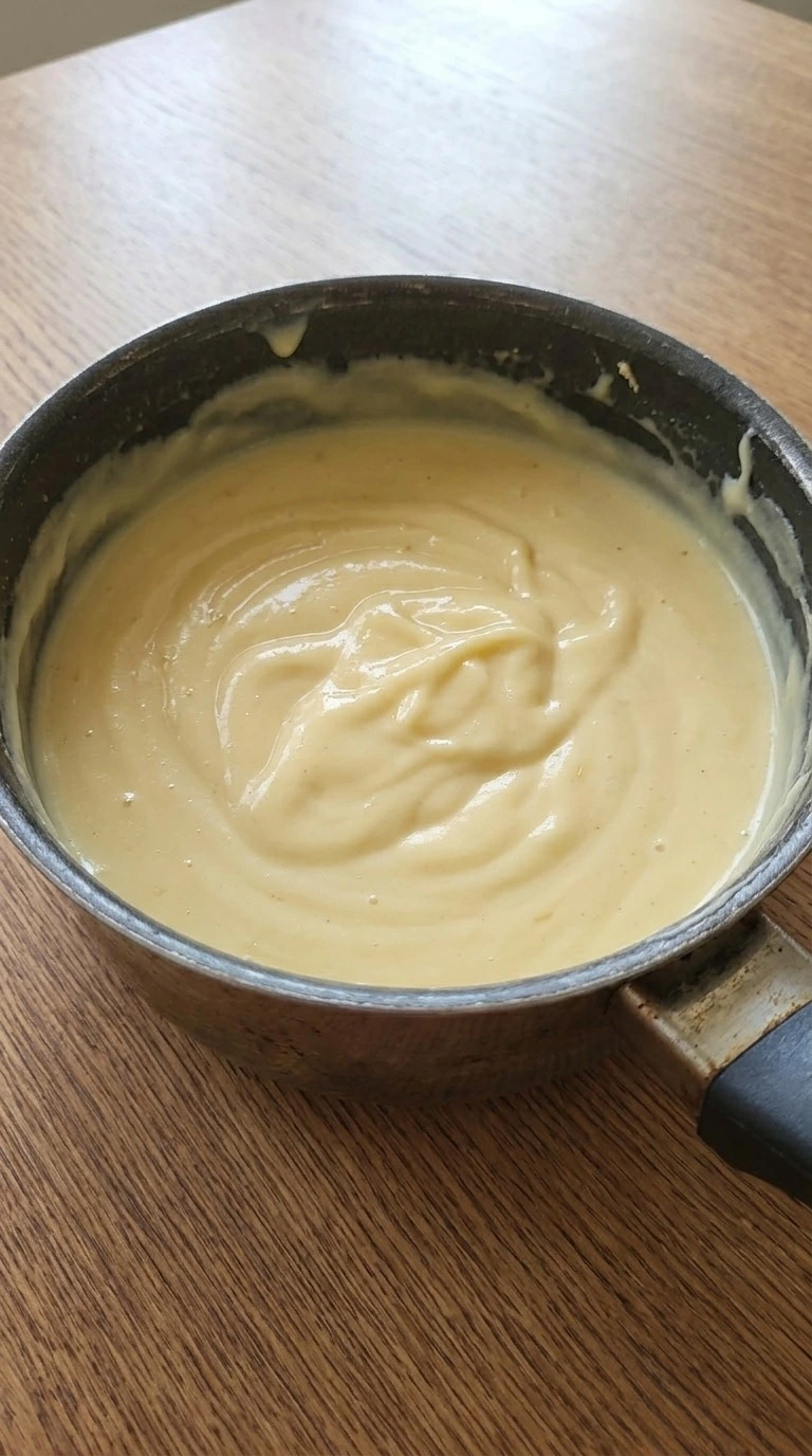 Christmas Trifle vanilla custard thickening in saucepan Recipe focus: christmas trifle easy.