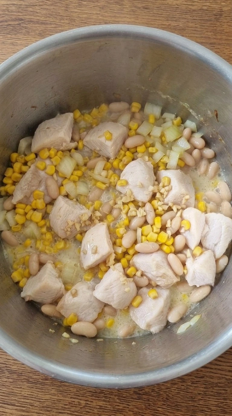Mexican Street Corn White Chicken Chili simmering with tender chicken and corn Recipe focus: crockpot white chicken chili.