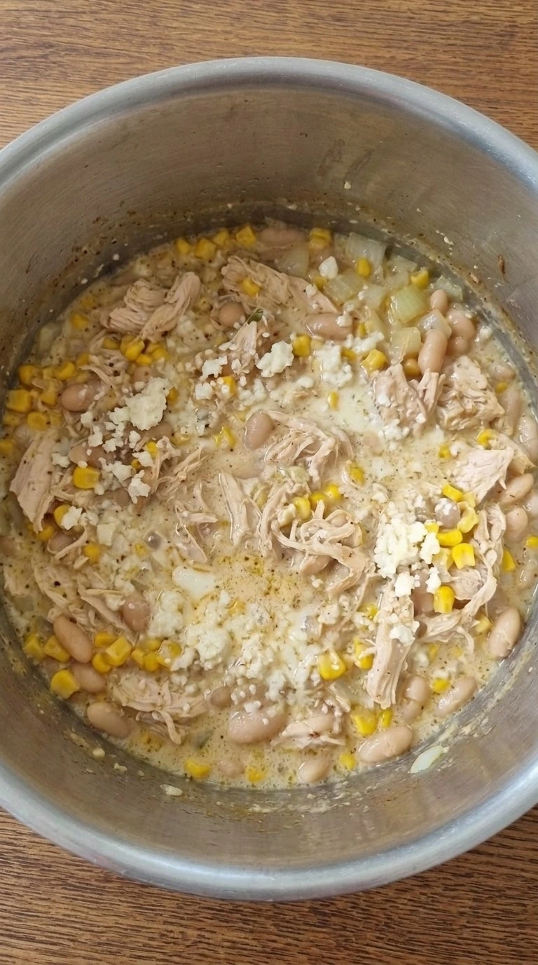 Mexican Street Corn White Chicken Chili with creamy broth and melted cheese Recipe focus: crockpot white chicken chili.