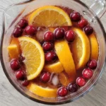 Non Alcoholic Christmas Punch with cranberry orange slices and sparkling drink Recipe focus: christmas punch non alcoholic.