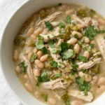 White Bean Chicken Chili served in a bowl with creamy beans and tender chicken Recipe focus: white chicken chili.